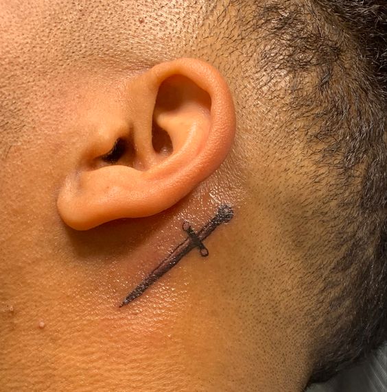 Dagger Tattoo Behind Ear